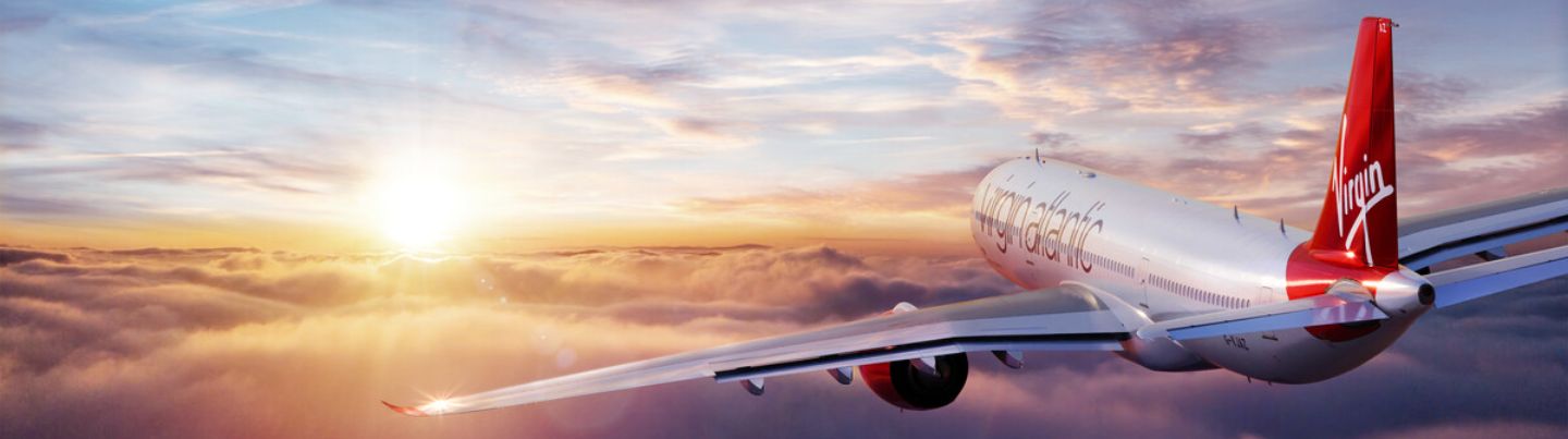 A330neo Virgin Atlantic aircraft flying into sunset