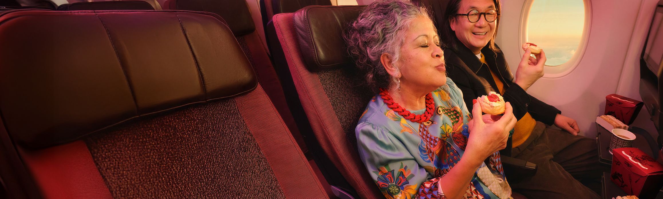 Couple in Economy delight seats