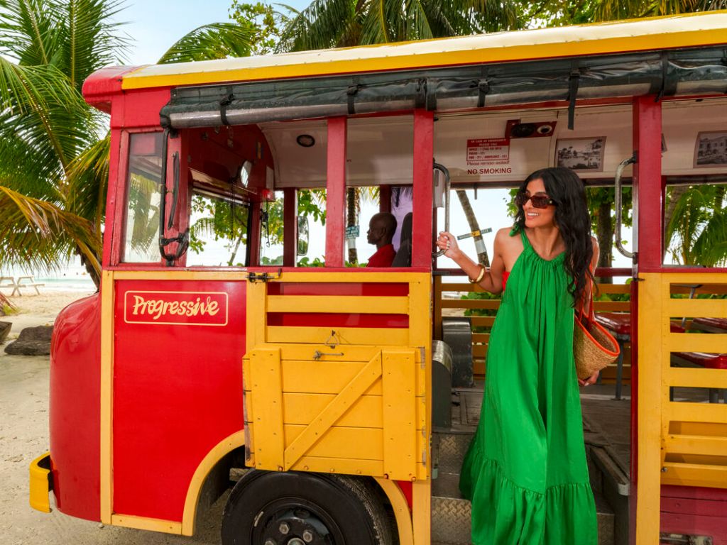 Lady getting off bus in Barbados