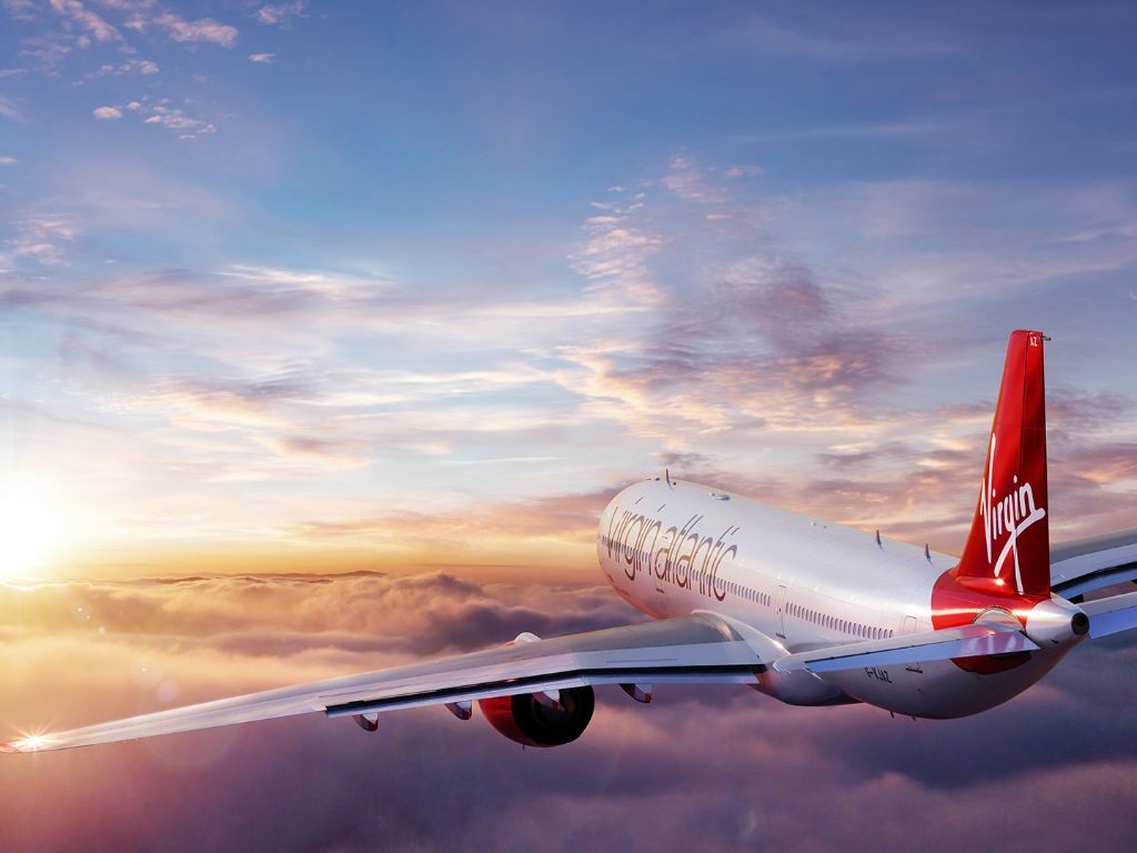 A Virgin Atlantic A330 aircraft soaring through the sky