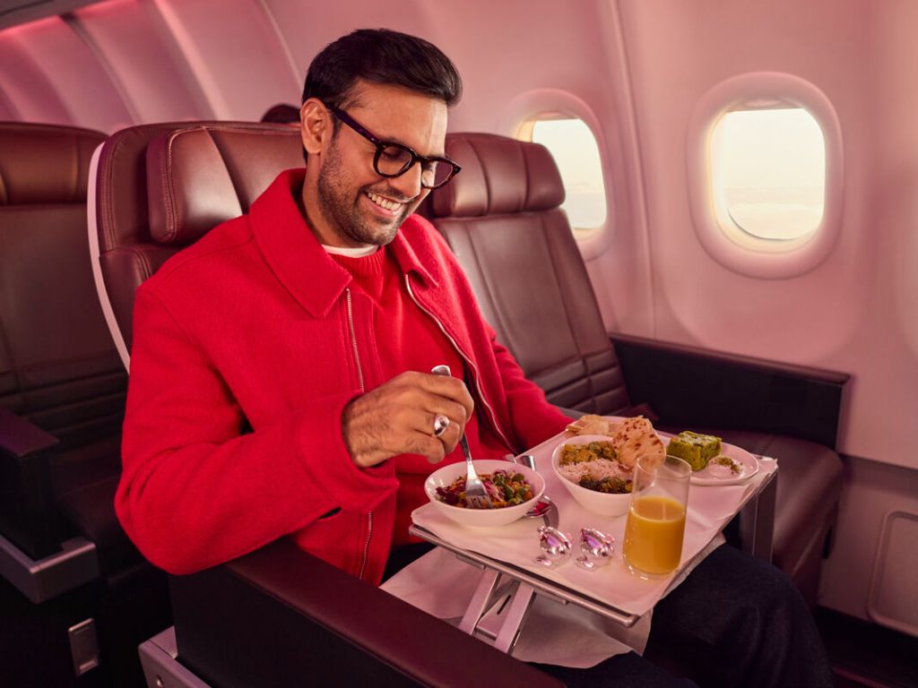 Man in Premium with meal