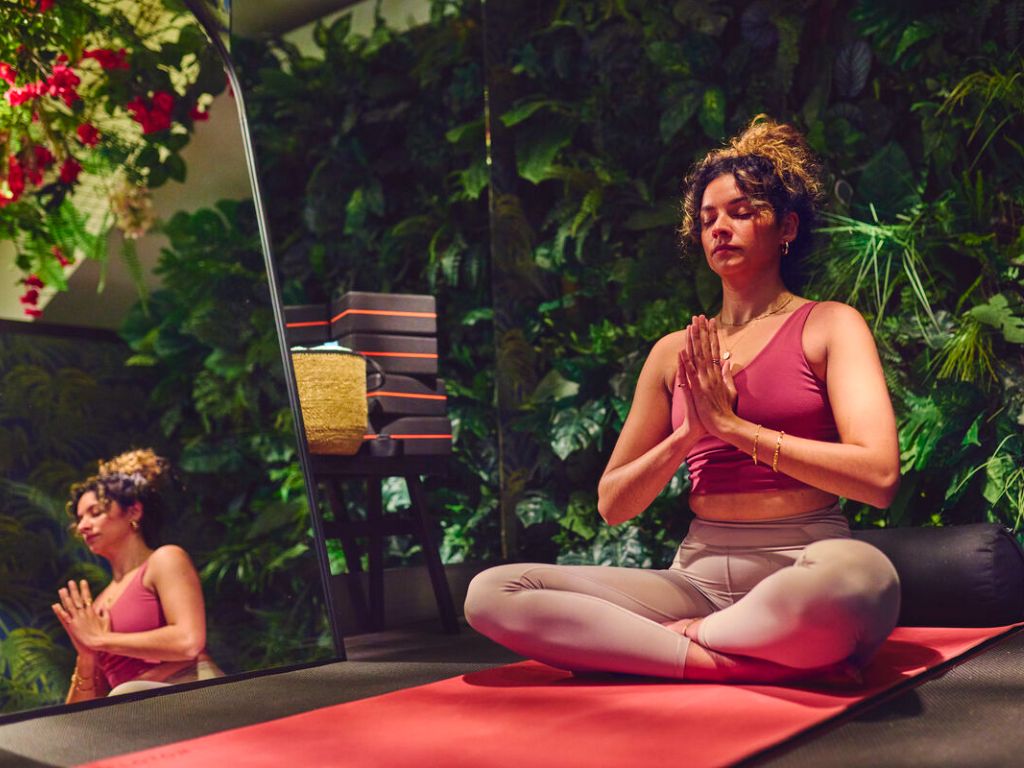 Lady sitting in yoga pose