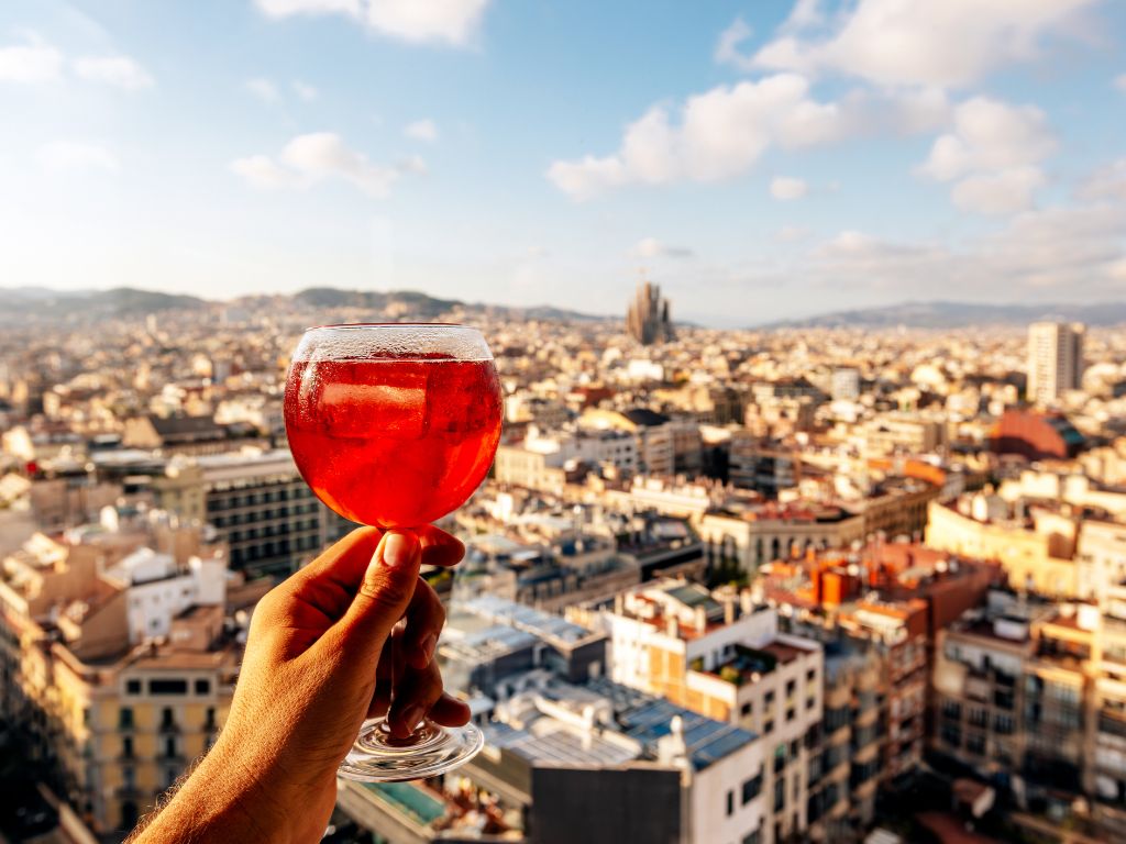 Cocktail on a rooftop overlooking Barcelona