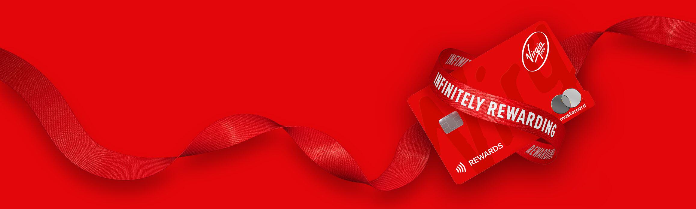 Red ribbon with a Virgin credit card on