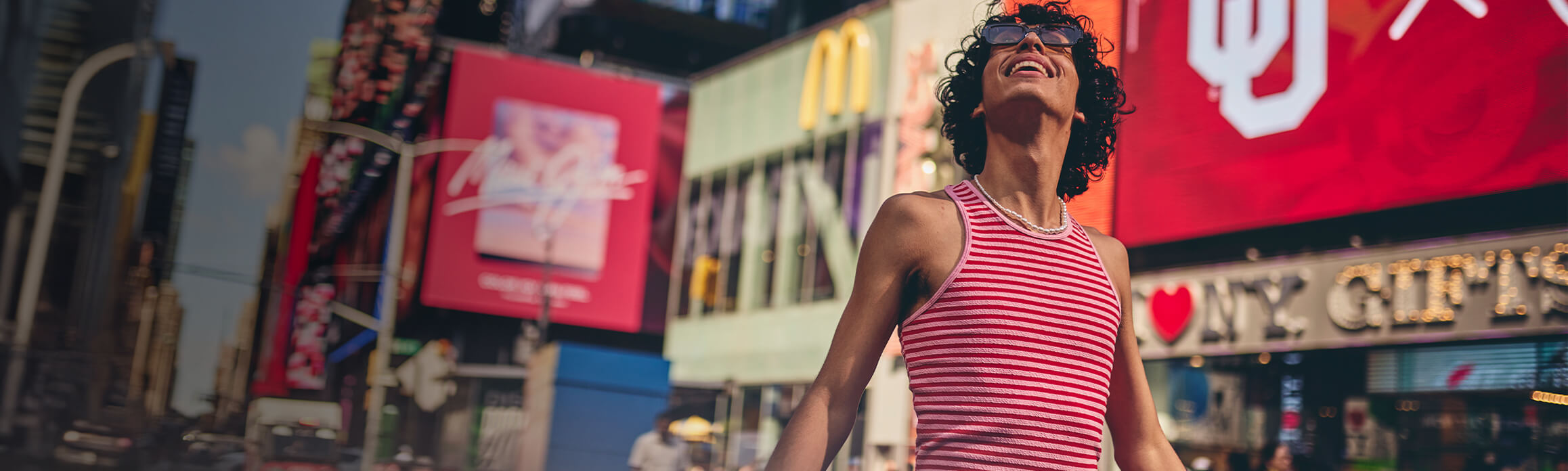 Man looking up walking in New York