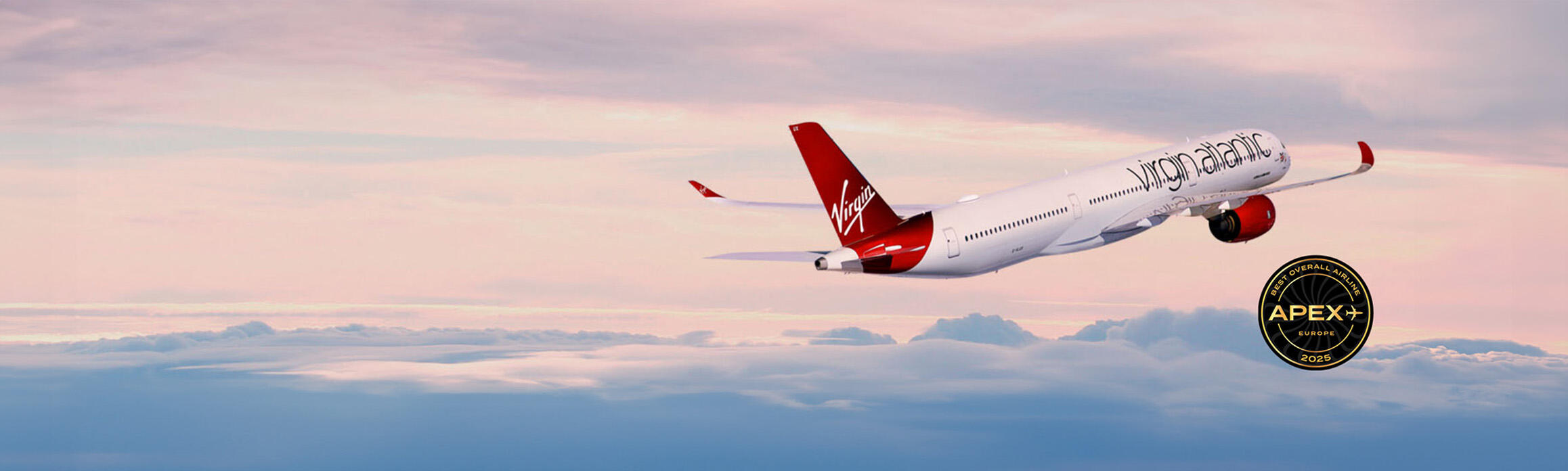 Virgin Atlantic plane flying into the sunset