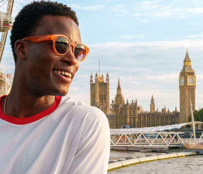 Man in red sunglasses on Westminster bridge