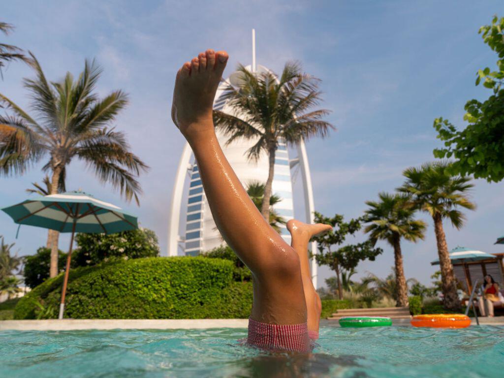Kid in pool in Dubai