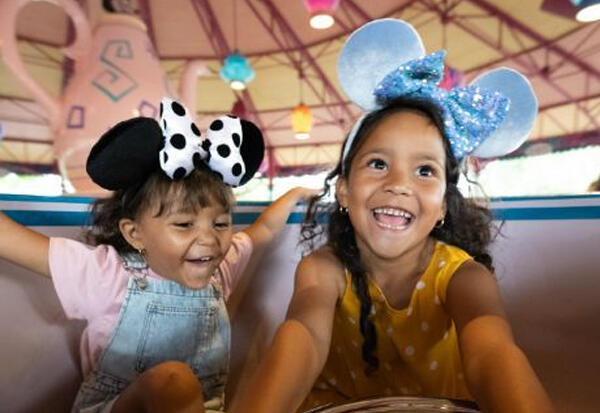 Guests on the teacups at Disney