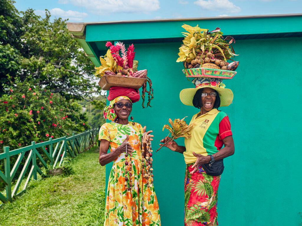 Ladies holding fruit in Grenada