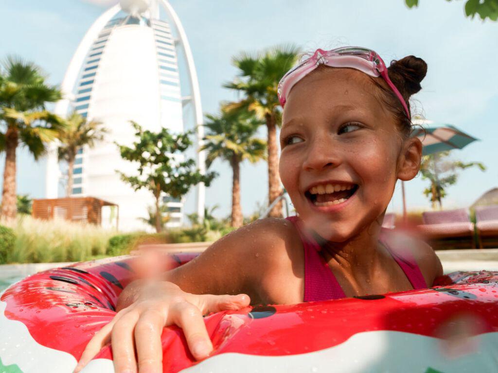 Girl in pool in Dubai