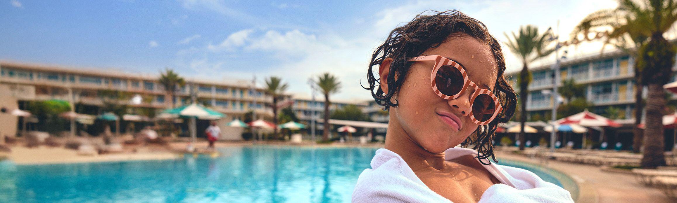 Boy by the pool in Orlando