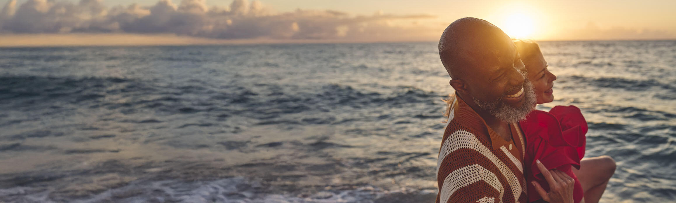 Couple on the beach at sunset