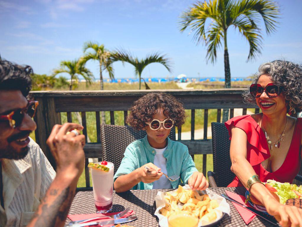 Family eating in the sun in Florida