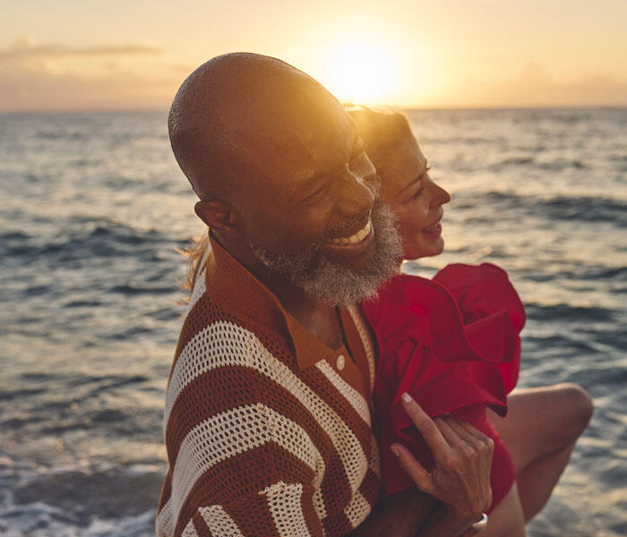 Couple on the beach at sunset