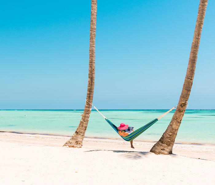 Lady in a hammock on the beach
