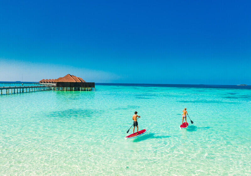 Couple paddleboarding