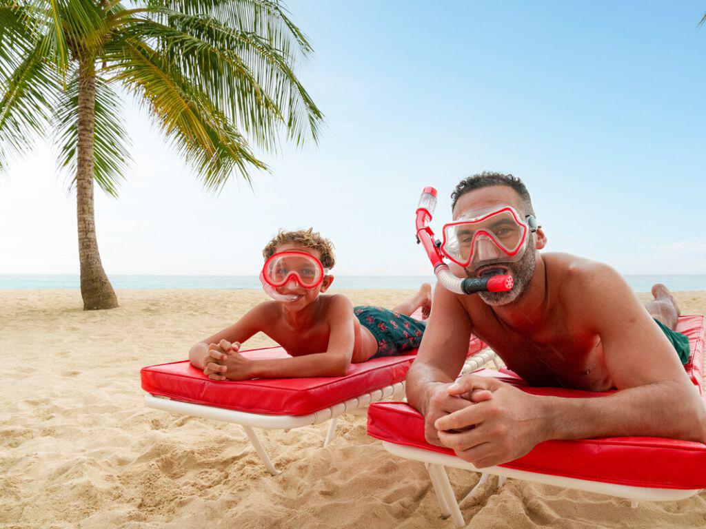 Man and son on the beach