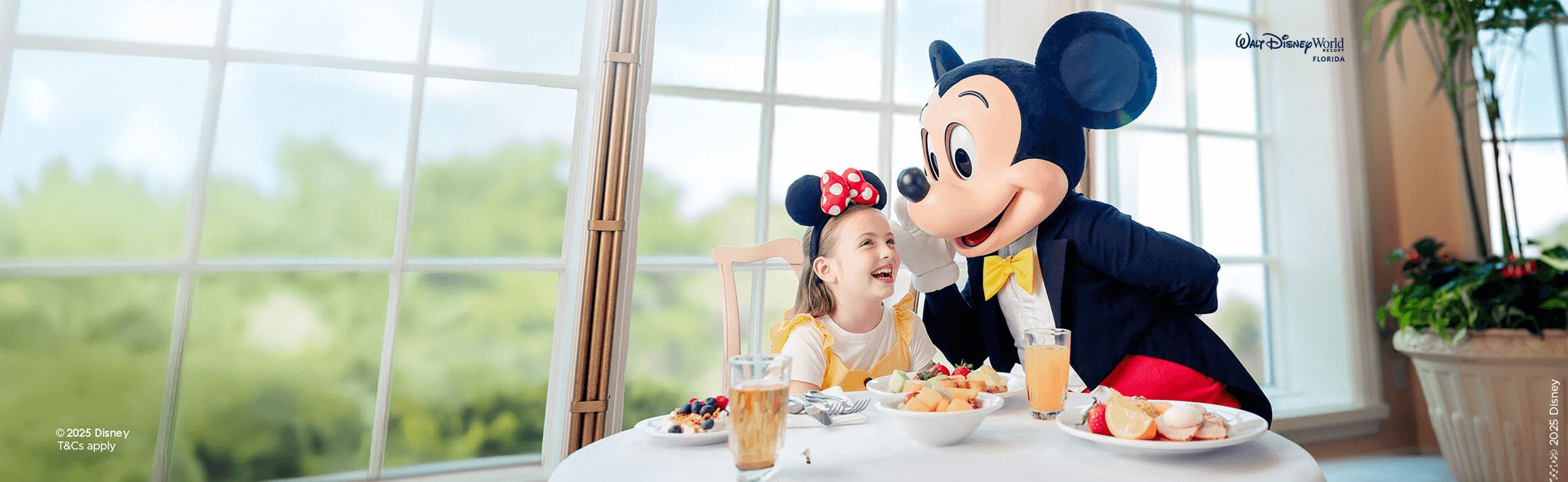 Mickey dining with a girl