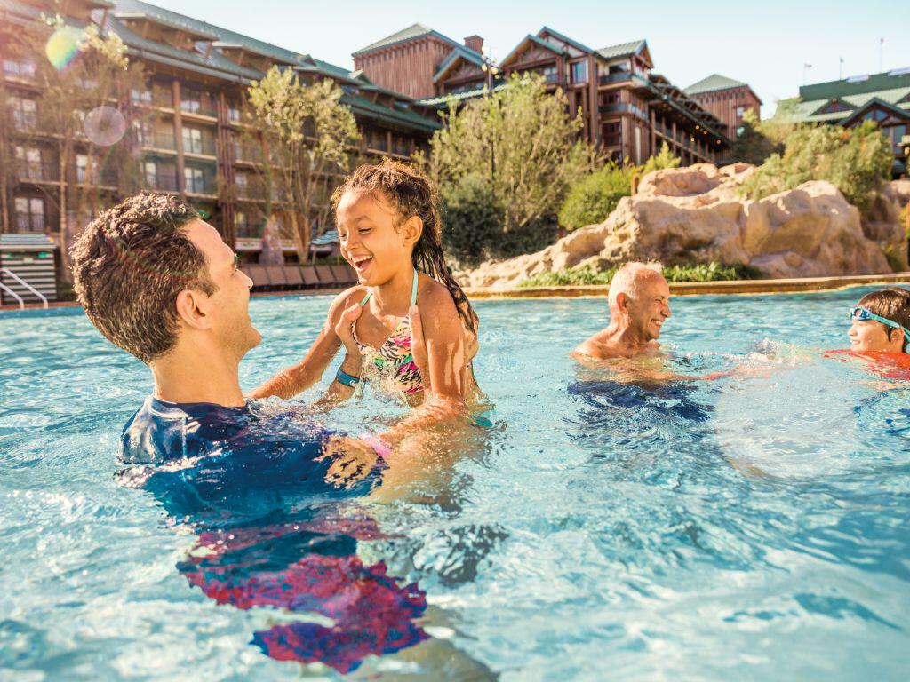 Family in pool at Disney's WIlderness Lodge