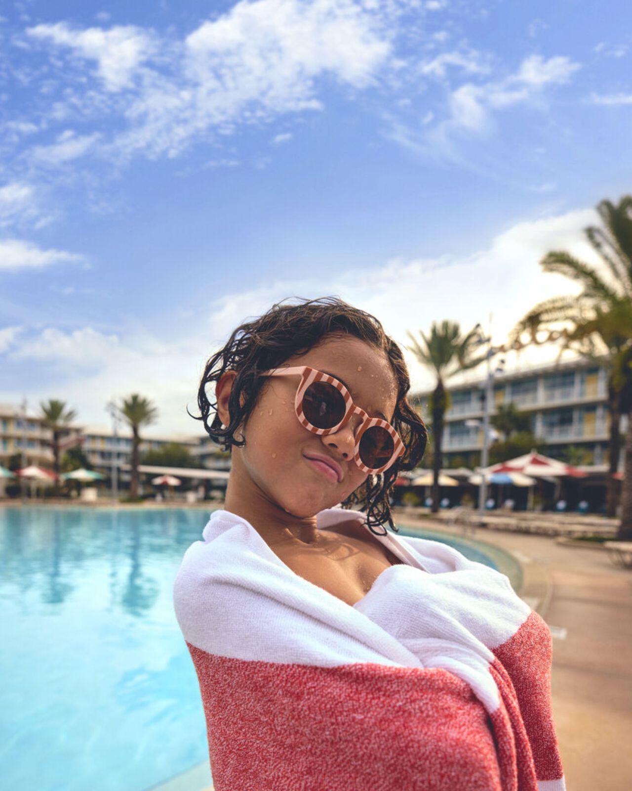 Boy by the pool