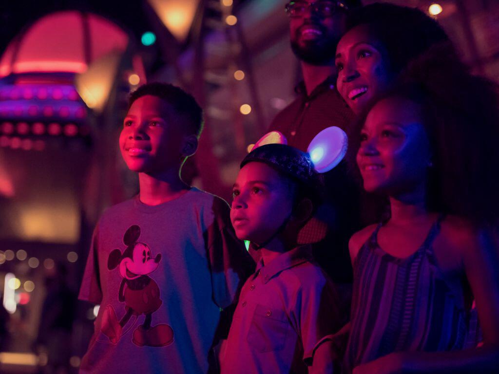 Guests watching Disney fireworks