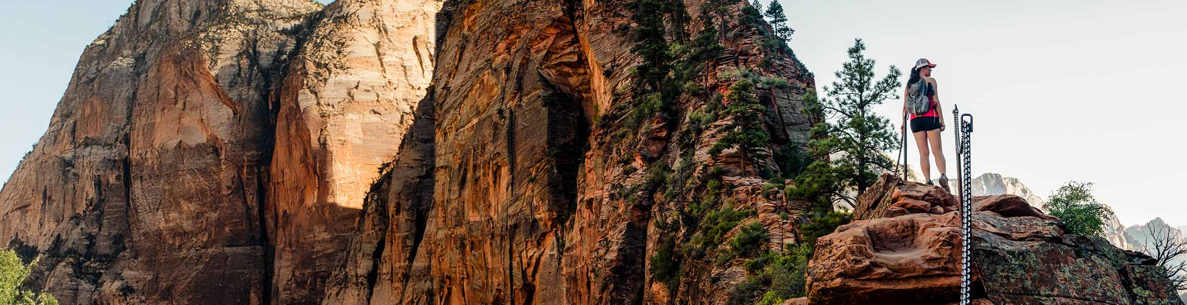 A lady hiking overlooking Zion Park 