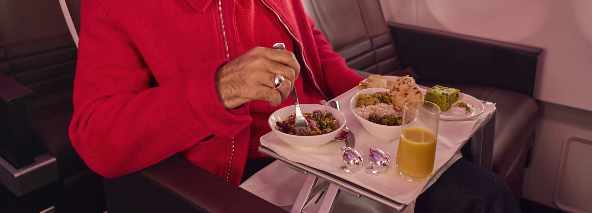 Man dining in Premium