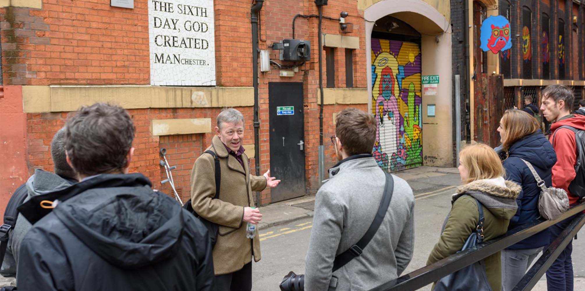 A walking tour takes place in Manchester