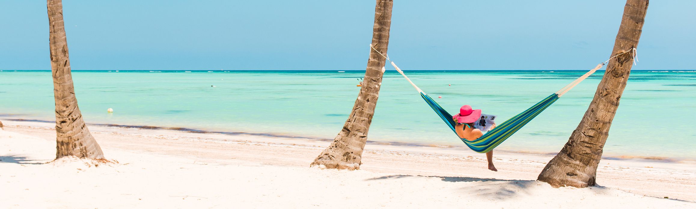 Lady in a hammock on the beach