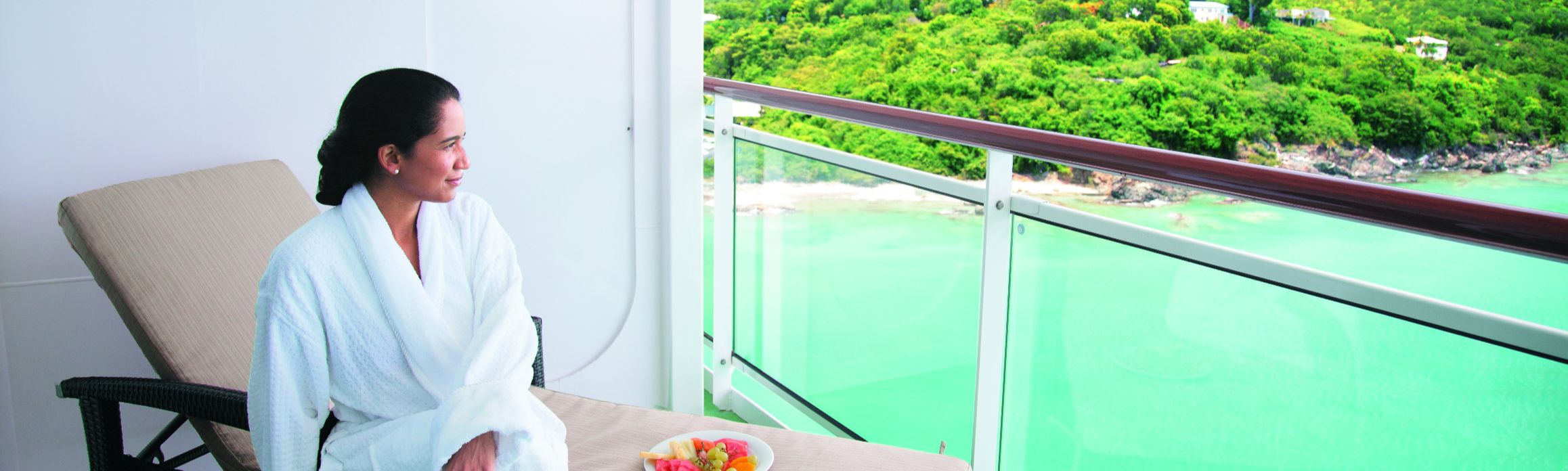 Lady on the balcony of her stateroom