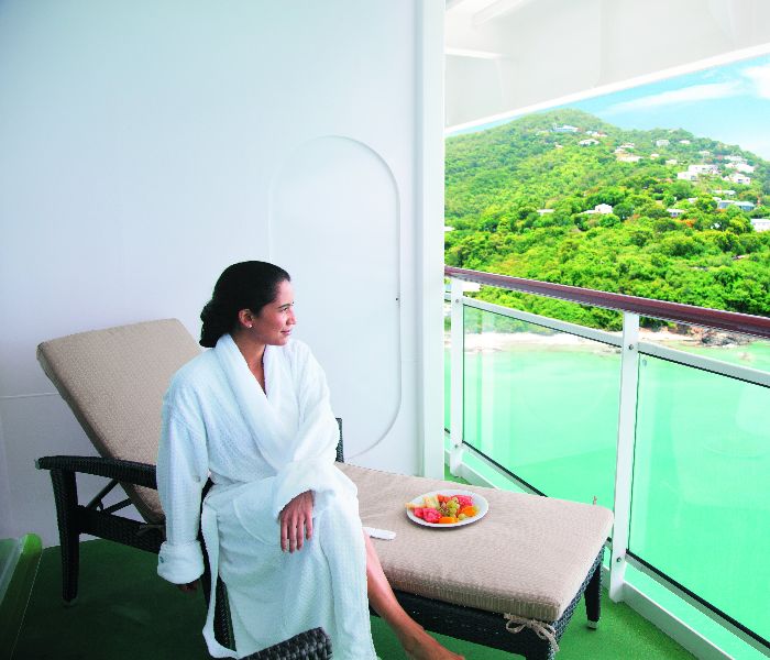 Lady on the balcony of her stateroom