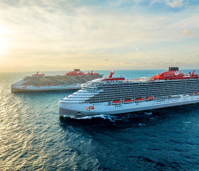 Scarlet Lady and Valiant Lady at sea