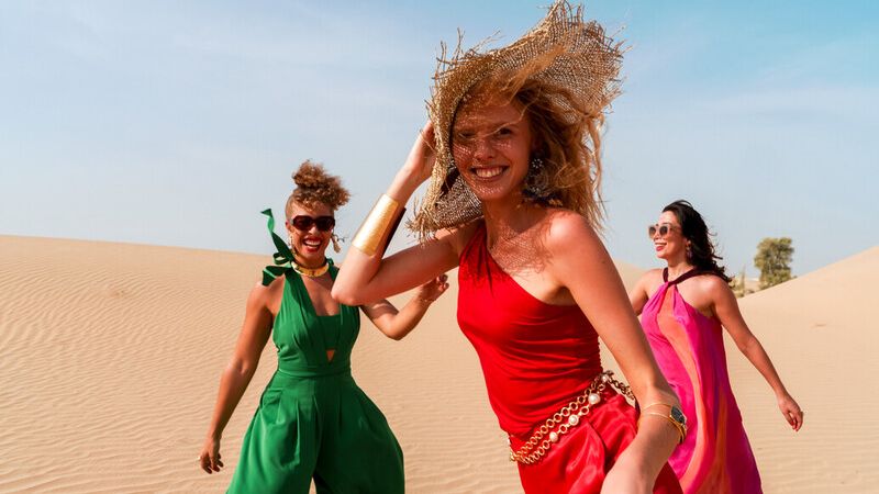 Three ladies in Dubai desert